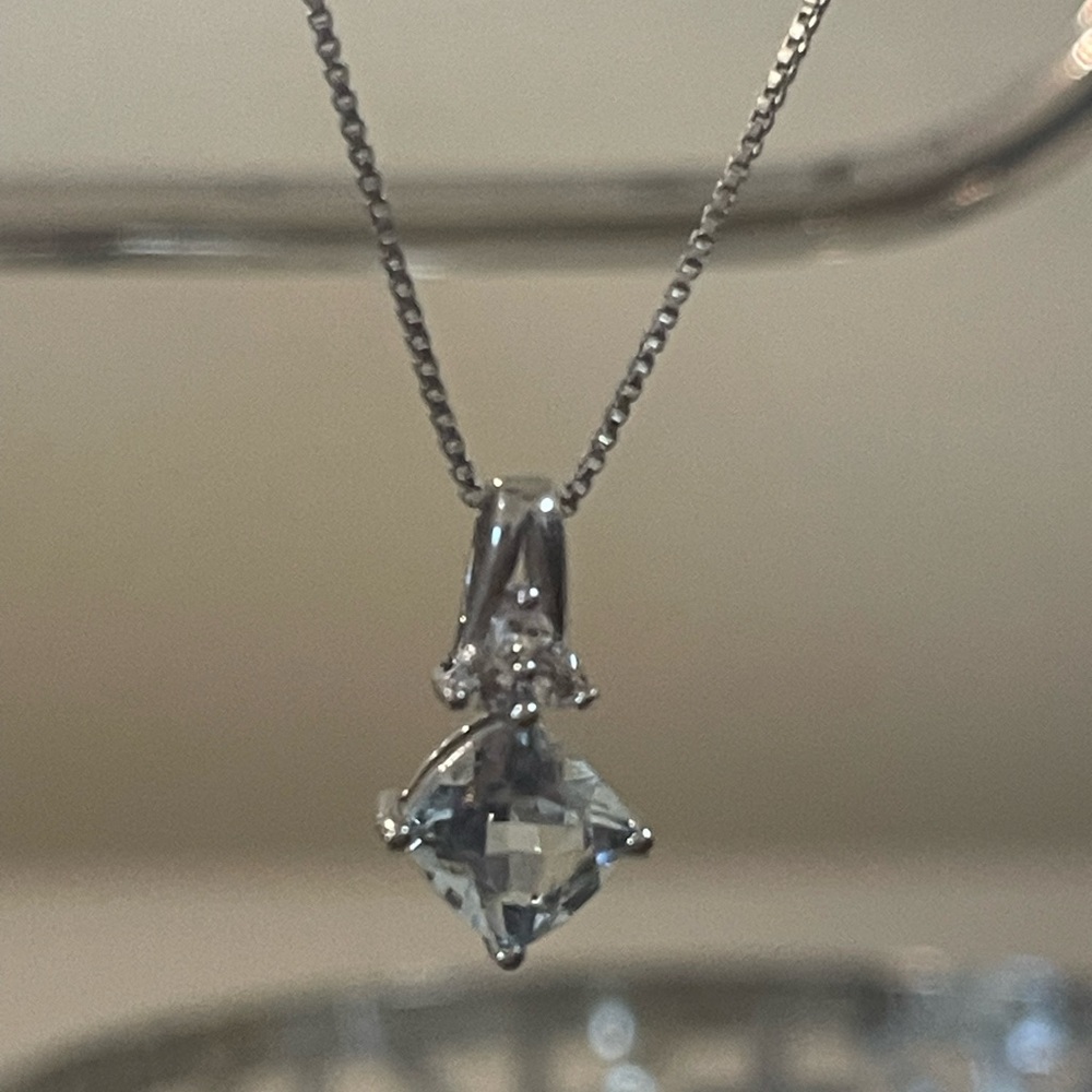 Elegant Silver Blue Topaz Pendant Necklace